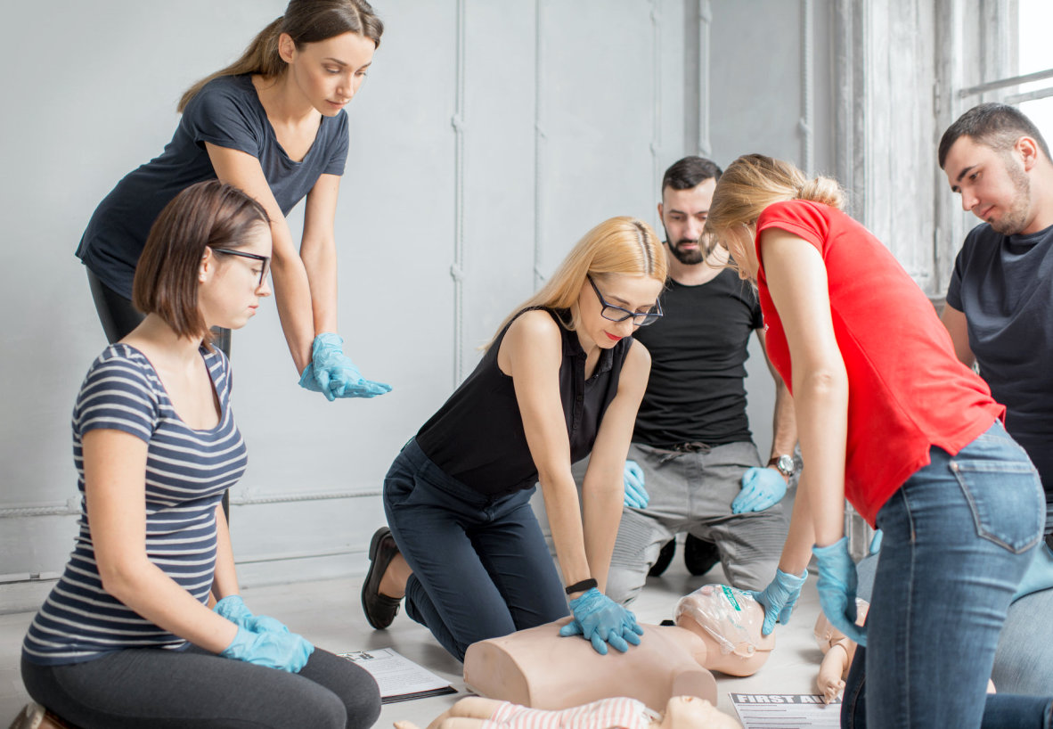 group of people doing cpr training