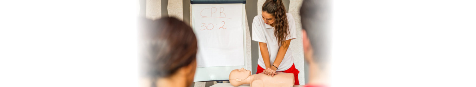 instructor showing how to cpr